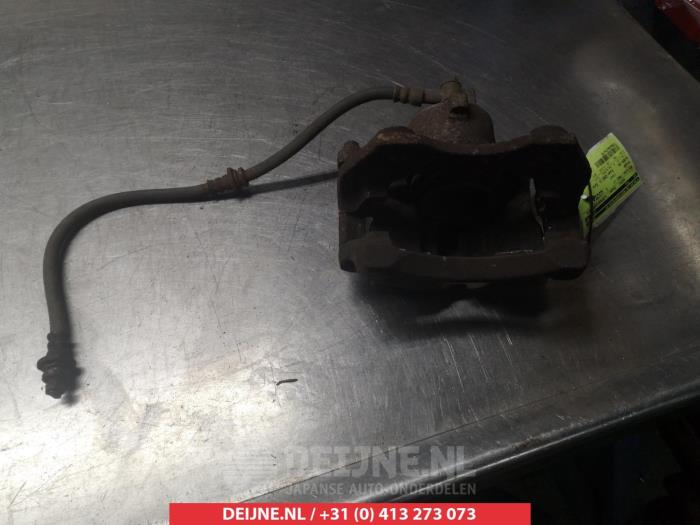 Nissan Almera Bremszange links vorne O324833