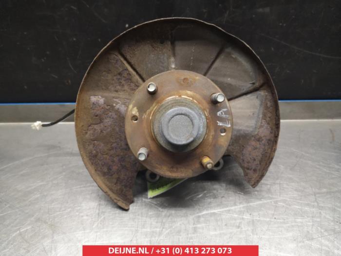Kia Carens Fusee links-achter O380409