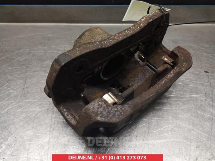 Kia Carens Remklauw (Tang) links-voor O325024