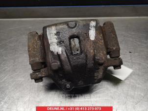 Kia Carens Bremszange links vorne O325024 foto 2