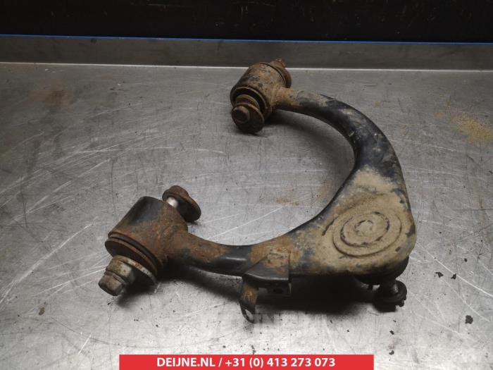 Toyota Landcruiser Draagarm boven rechts-voor O380926