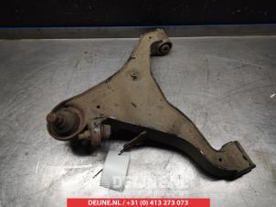 Nissan Navara Querlenker unten links vorne O381264 foto 2