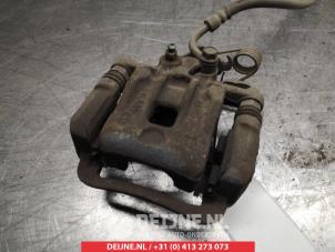 Kia Carens Rear brake calliper, left O376257 photo 2