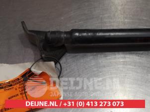 Kia Carens Gasdemper links-achter O293979 foto 2