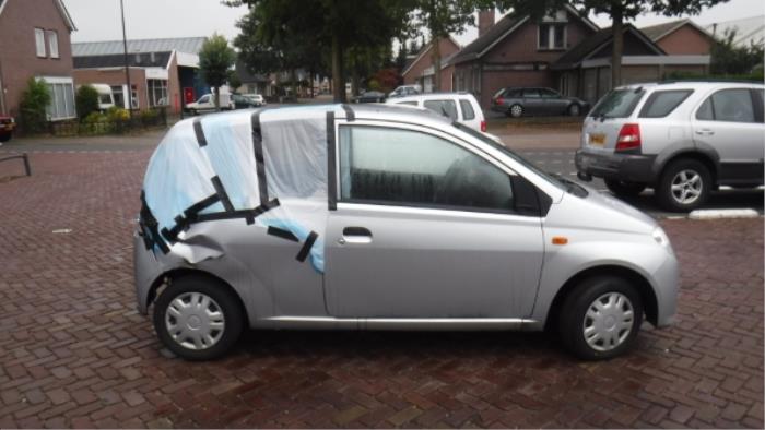 Daihatsu Cuore Tür 2-türig rechts O271930
