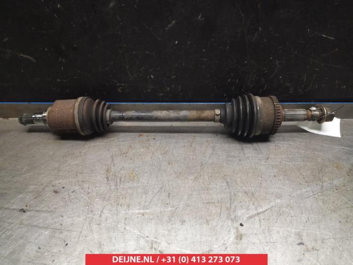 Nissan Almera Tino Aandrijfas links-voor O317816