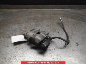 Suzuki Celerio Bremszange links vorne O325488 foto 2