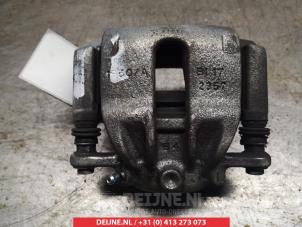 Nissan Micra Bremszange links vorne O324823 foto 2