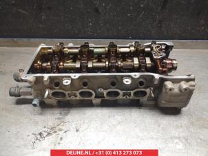 Nissan Micra Cilinderkop O352138 foto 2
