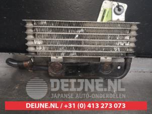Nissan Almera Tino Oliekoeler O341288 foto 2