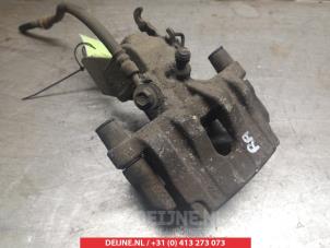 Nissan Primera Bremszange rechts hinten O376910 foto 2