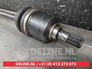 Nissan Primera Aandrijfas rechts-voor O319250 foto 3