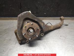 Nissan Navara Fusee links-voor O322570 foto 2
