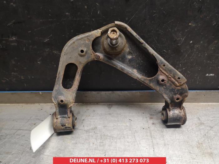 Nissan Navara Draagarm Boven links-voor O380593