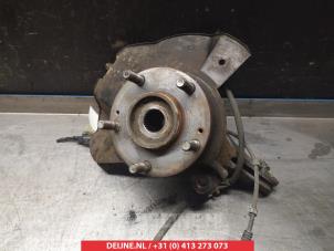 Kia Carens Achsschenkel links vorne O322668 foto 2