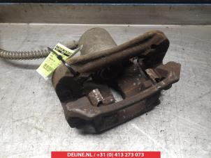 Kia Carens Bremszange rechts hinten O377058 foto 2
