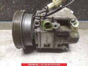 Gebruikte Pomp Airco Mazda Premacy 1.8 16V Prijs € 25,00 Margeregeling aangeboden door V.Deijne Jap.Auto-onderdelen BV