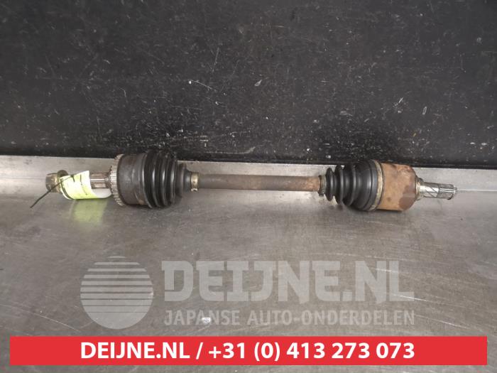 Nissan Almera Tino Aandrijfas links-voor O317811