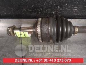 Nissan Almera Tino Front drive shaft, left O317811 photo 2