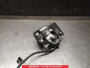 Kia Rio Bremszange links vorne O325102 foto 2