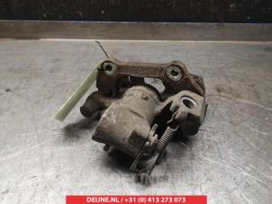 Toyota Yaris Rear brake calliper, left O376669 photo 2