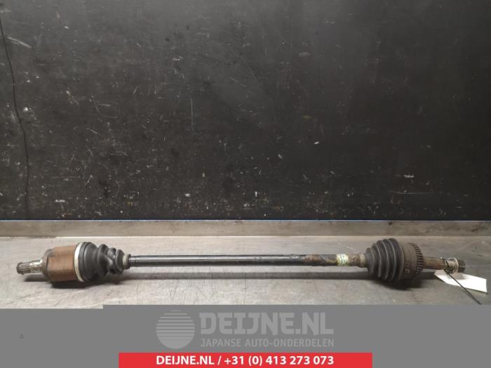 Nissan Almera Aandrijfas rechts-voor O319235