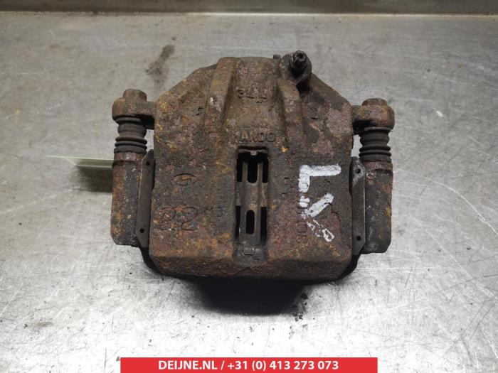 Hyundai Matrix Bremszange links vorne O324688