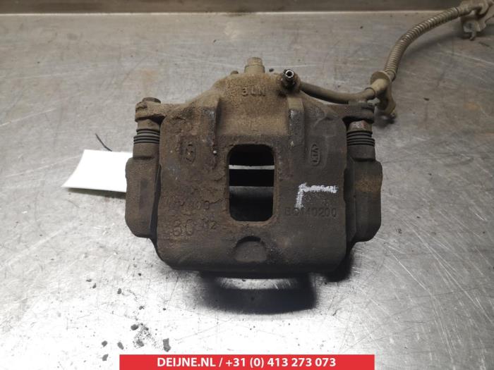 Kia Carens Remklauw (Tang) links-voor O325013