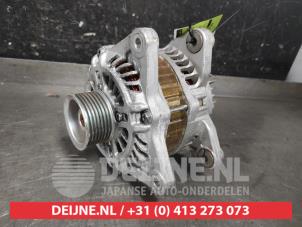 Gebruikte Dynamo Nissan Micra C+C (K12) 1.6 16V Prijs € 35,00 Margeregeling aangeboden door V.Deijne Jap.Auto-onderdelen BV