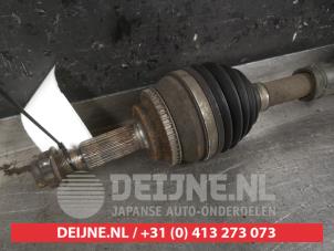 Toyota Corolla Aandrijfas rechts-voor O320084 foto 2