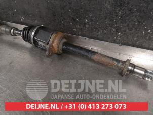 Toyota Corolla Aandrijfas rechts-voor O320084 foto 3