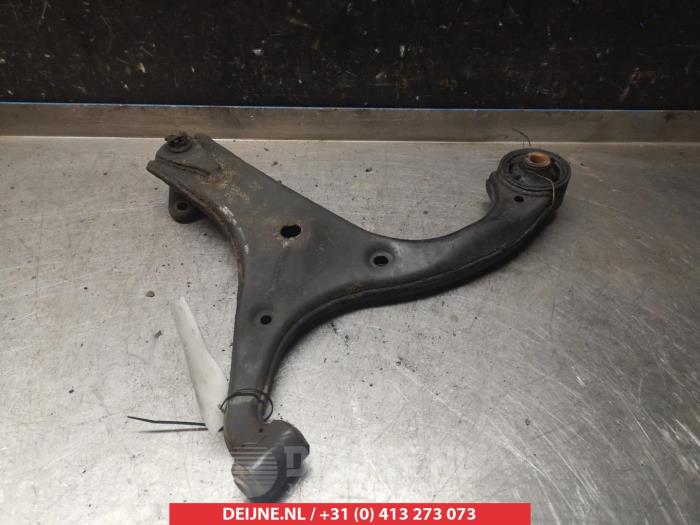 Kia Rio Draagarm onder rechts-voor O382373