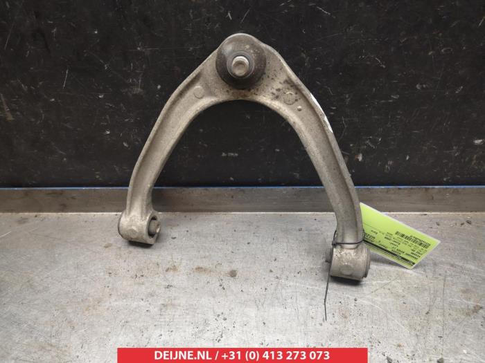 Nissan 370Z Front upper wishbone, left O380561