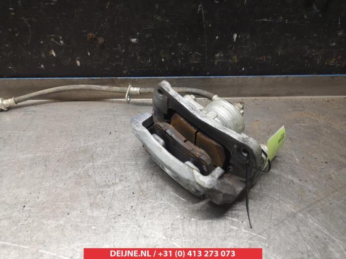 Suzuki Swift Bremszange links vorne O325542