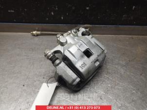 Suzuki Swift Front brake calliper, left O325542 photo 2