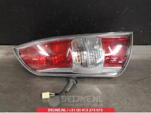 Subaru Justy Rücklicht links O297868 foto 2