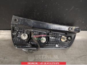 Subaru Justy Rücklicht links O297868 foto 3