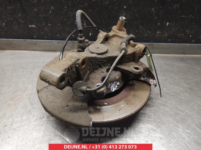 Kia Carens Fusee links-achter O380410