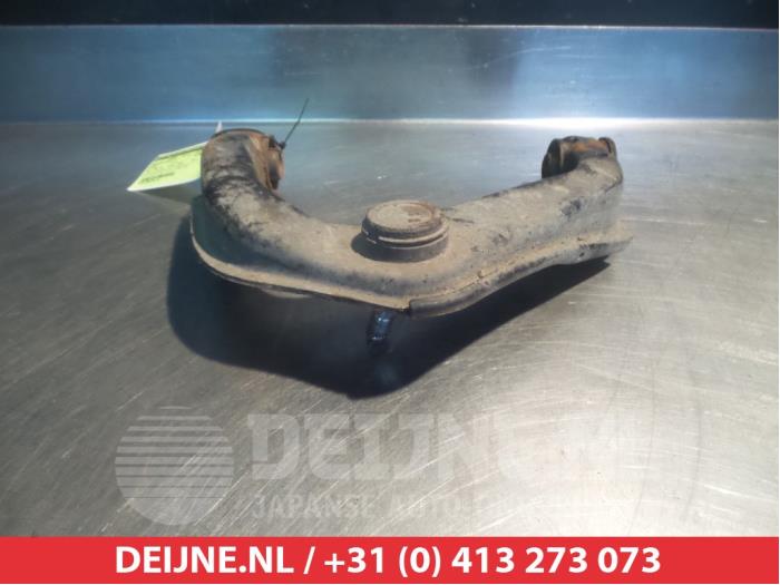 Nissan Navara Draagarm Boven links-voor O380592
