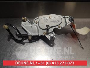 Daihatsu Sirion Ruitenwissermotor achter O301290 foto 2