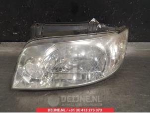 Hyundai Matrix Scheinwerfer links O266392 foto 2