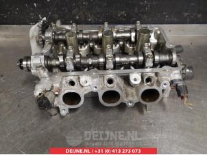 Gebruikte Cilinderkop Mitsubishi Space Star (A0) 1.2 12V Prijs op aanvraag aangeboden door V.Deijne Jap.Auto-onderdelen BV