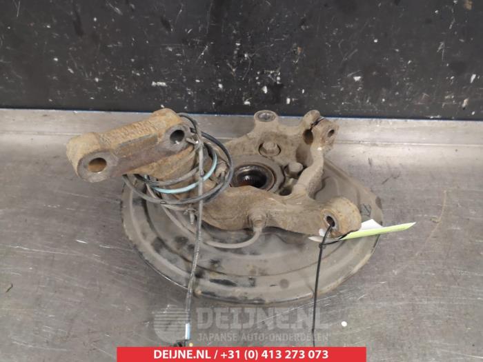 Nissan Juke Fusee links-voor O322510