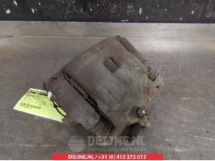 Suzuki Swift Bremszange links vorne O325549 foto 2