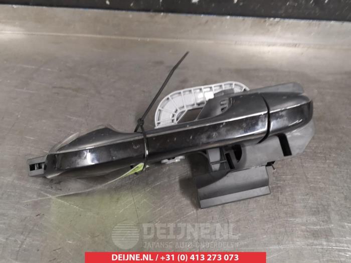 Kia Sportage Rear door handle 4-door, left O291893