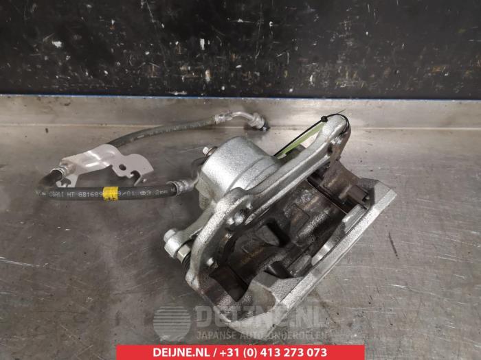 Kia Sportage Front brake calliper, left O325098