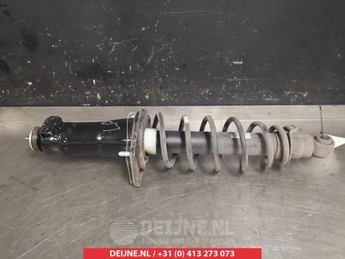Mazda RX-8 Schokdemperpoot links-achter O377633