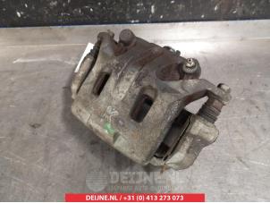 Nissan 350 Z Bremszange links vorne O324922 foto 2