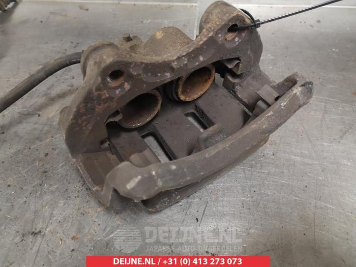 Nissan Maxima Bremszange links vorne O324924