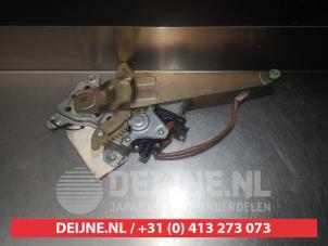 Toyota Landcruiser Fenstermechanik 4-türig links hinten O290975 foto 2